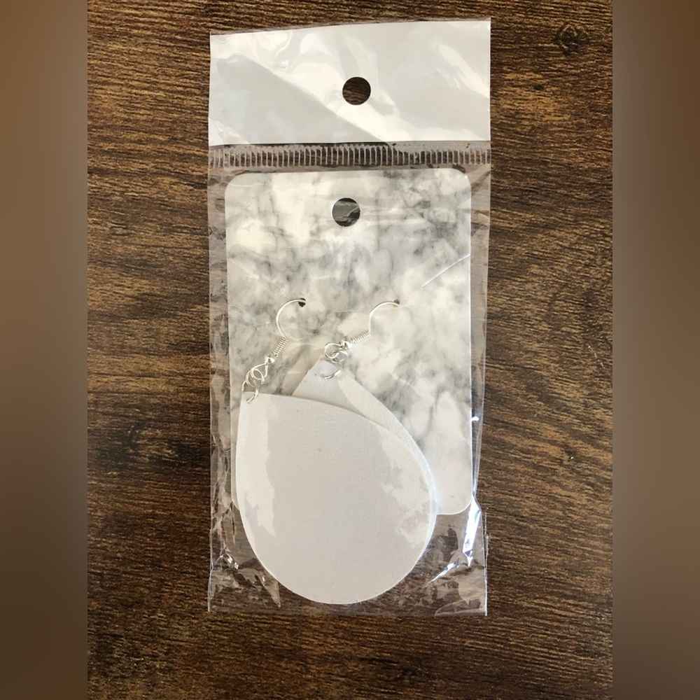 NEW IN PACKAGE Leather Earrings